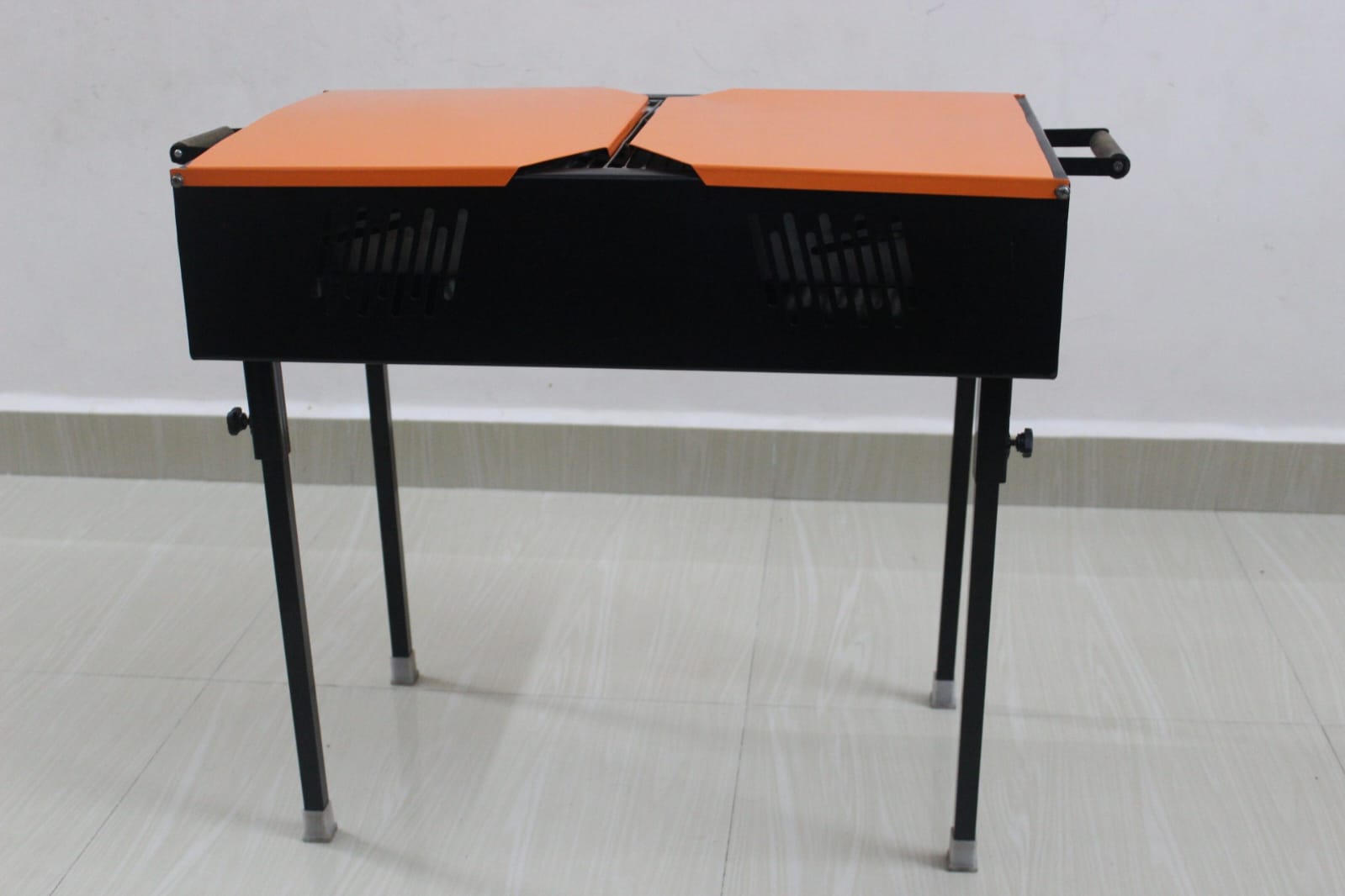 Grillon BBQ Grill Rental orange fully closed view